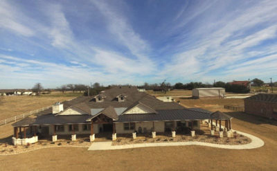 Concrete, Large home wrap around patio, Compass Custom Homes