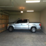 Truck in garage, Compass Custom Homes
